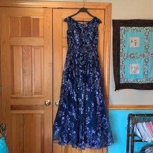 Beautiful beaded navy gown. Never worn. Perfect for prom or wedding.